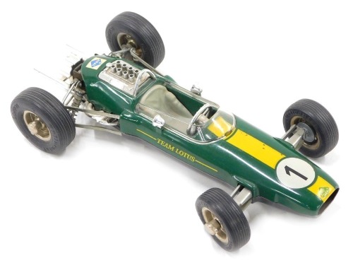 A Schuco 1071 model of a Lotus Climax 33 Formula 1 racing car