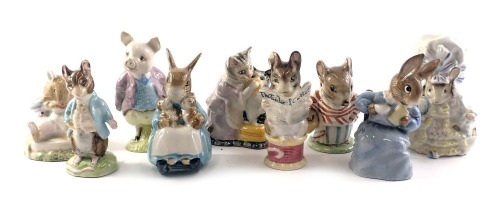 Nine Beswick Beatrix Potter figures, comprising Johnny Town-Mouse, Rabbit and Bunnies, Pigling Blank, Tabitha Twitchit and Miss Moppet, Mrs Tittle-Mouse, Cotton Tail, Tailor of Gloucester, Lady Mouse, and a Royal Doulton Mr Toadflax. (9)