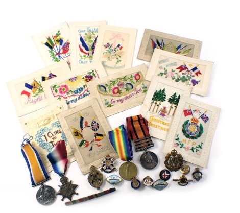 WWI and later related militaria, comprising The Civilisation and Defence medals, inscribed 9261PTEJ Spowage R.A.M.C, South Africa medal with relief of Cape Colony and Tugela Heights bar stamped 3517 PTE W.Spowage 2:RSCO, a WWI star to the same, cap badges