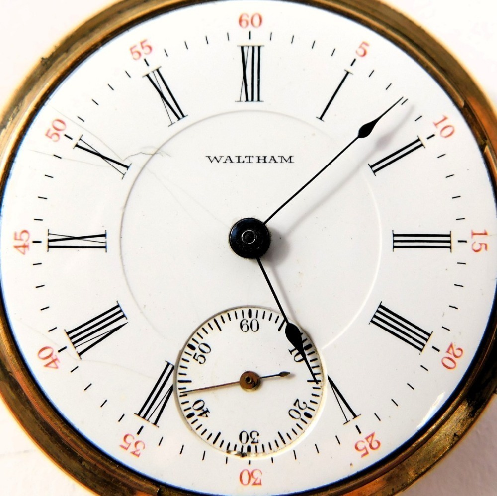 Numeric Watch A 1950s Waltham gold plated pocket watch, with white enamel Roman ...
