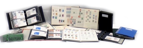 A collection of stamps, five albums of QEII, European, etc., and first day covers etc.