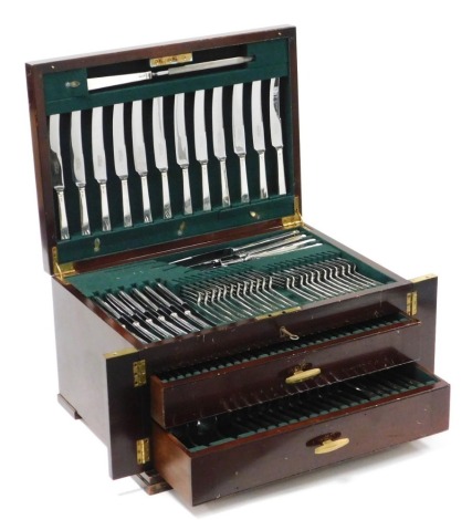 An Elizabeth II silver canteen of cutlery, twelve place settings, one hundred and thirty six pieces, in a three section two drawer mahogany cabinet, with key, Cooper Brothers and Sons, Sheffield 1978, silver pieces 150.38oz, remaining pieces 54.65oz.