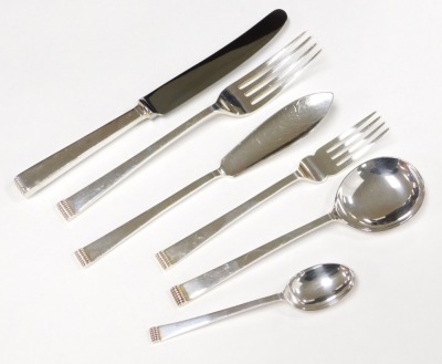 An Elizabeth II silver canteen of cutlery, twelve place settings, one hundred and thirty six pieces, in a three section two drawer mahogany cabinet, with key, Cooper Brothers and Sons, Sheffield 1978, silver pieces 150.38oz, remaining pieces 54.65oz. - 5