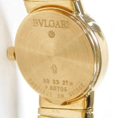 A Bulgari lady's 18ct gold cased wristwatch, with black dial bearing Arabic numerals at 6 & 12, quartz movement, on an expanding bracelet strap, reference BB232T, serial no. P80706, stamped to case back and strap, boxed and outer boxed, 78.4g all in. - 2