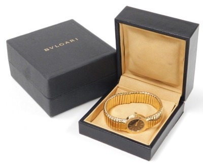 A Bulgari lady's 18ct gold cased wristwatch, with black dial bearing Arabic numerals at 6 & 12, quartz movement, on an expanding bracelet strap, reference BB232T, serial no. P80706, stamped to case back and strap, boxed and outer boxed, 78.4g all in. - 4