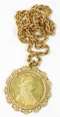 An Austrian gold 4 carat coin 1915, restrike, the obverse with the laureate head of Emperor Franz Joseph I, reverse with the Imperial coat of arms, with crowned, double headed eagle, in a yellow metal pendant mount, on a rope twist neckchain, the oval lin - 2