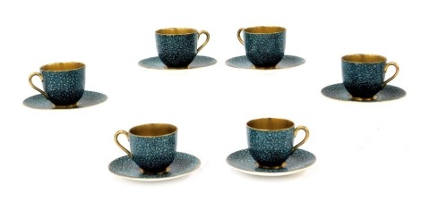 A set of six early 20thC Royal Worcester porcelain demi-tasse coffee cups and saucers, decorated in a blue pebble pattern, no. Z218, painted and printed marks.