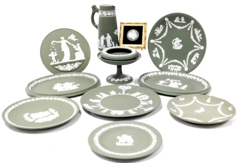 A group of Wedgwood green Jasperware, including plates, tazza, plaque, circular dish, and a framed cameo. (a quantity)