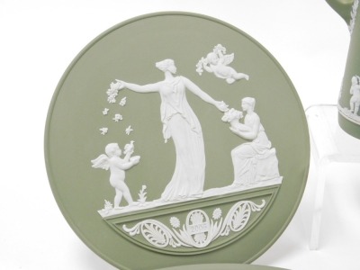 A group of Wedgwood green Jasperware, including plates, tazza, plaque, circular dish, and a framed cameo. (a quantity) - 3