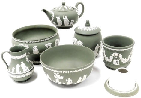 A group of Wedgwood green Jasperware, including two fruit bowls, small jardiniere, and a teapot, together with a night light. (a quantity)