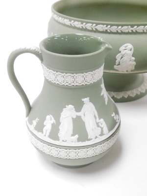 A group of Wedgwood green Jasperware, including two fruit bowls, small jardiniere, and a teapot, together with a night light. (a quantity) - 2