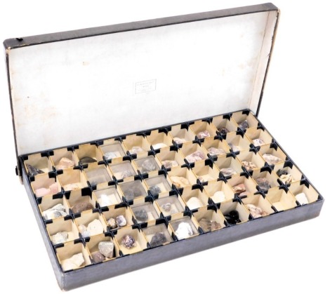 A collection of crystals, agates, shark's teeth, etc., in a fifty division box, manufactured by E J Bradstreet & Sons Limited, London.