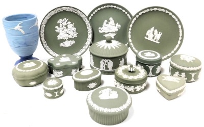 A group of Wedgwood green Jasperware, including variously shaped trinket boxes and covers, and three tea plates, together with a commemorative vase for Bermuda 1609-2009, sprigged with birds, on a turquoise marbled ground, boxed, 15cm high.