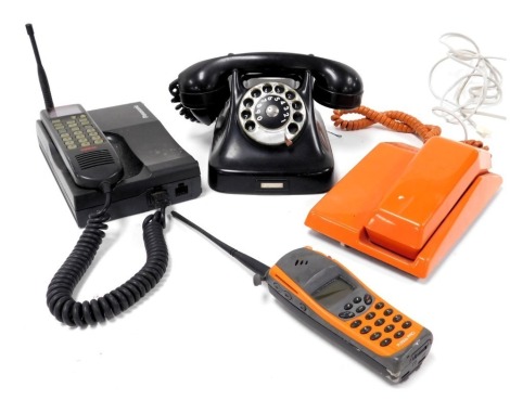 A vintage black dial telephone, no. 213212, GC orange Contempra slim line dial telephone, Panasonic Vodafone telephone and an Ericsson R250S Pro mobile phone. (4)