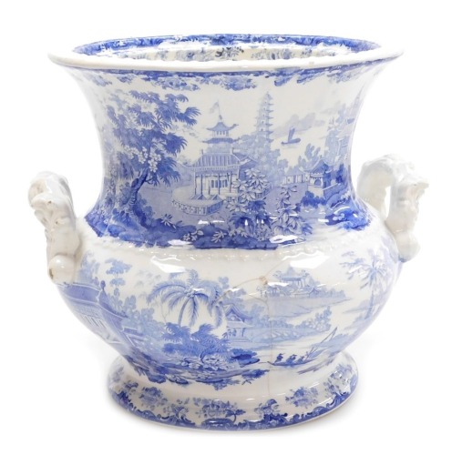 An early 19thC Minton blue and white pottery wash pail, of twin handled fluted baluster form, transfer decorated in the Chinese Marine pattern, printed mark, 25cm high. (AF)