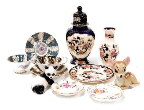 A group of ceramics, including a pair of Paragon porcelain tea cups and saucers, Wade blow up figure of Bambi, two Royal Crown Derby Derby Posies dishes, Mason's Royal Mandalay octagonal vase and cover, and a Lomonosov figure of a panda. (a quantity)