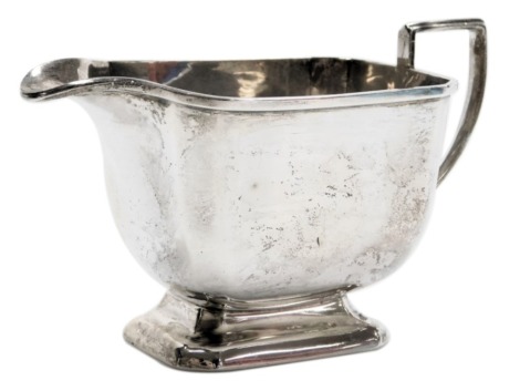 A George VI silver sauce boat, of canted, rectangular and footed form, Birmingham 1938, 5.09oz.