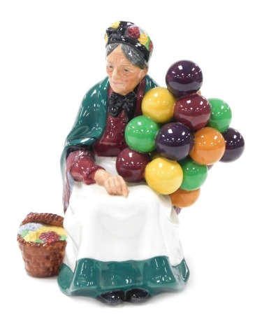 A Royal Doulton figure modelled as the Old Balloon Seller, HN1315.