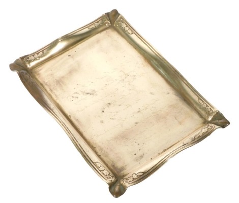 A late 19thC Tiffany and Company brass tray, with engraved script decoration, impressed marks verso, 18.5cm x 13.5cm.