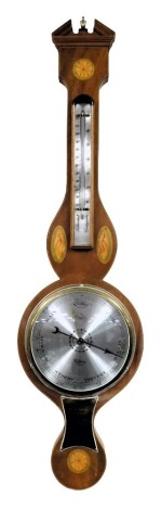 A Georgian style mahogany cased wheel barometer by Comitti of Holborn, with thermometer, the case of classical form with shell and sunburst paterae inlay, with brass presentation plaque, 94cm high.