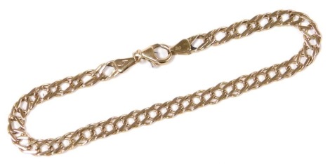 A 9ct gold double curb link bracelet, on a lobster claw clasp, 4.9g.