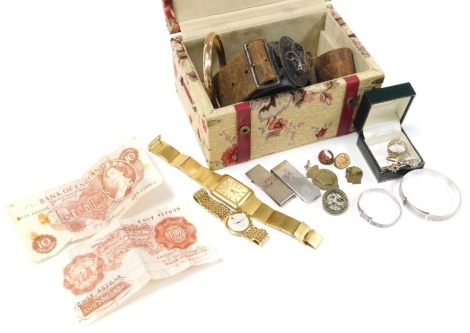 Silver and costume jewellery, including a rolled gold bangle, silver medallion, dress wristwatches and rings, together with two silver paper clips, two ten shilling banknotes and a scouting belt.