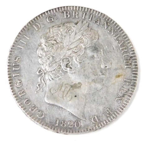 A George III silver crown 1820.