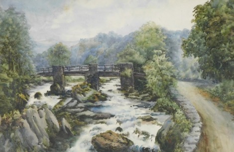 British School (early 20thC). Country landscape with a bridge over a flowing river, watercolour, 35cm x 52.5cm.