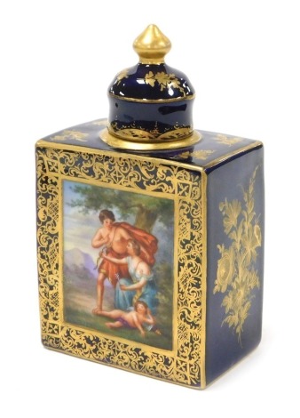 A 19thC Vienna porcelain tea caddy and cover, of rectangular section, painted with reserves of classical figures, on a cobalt blue ground, gilt heightened, and decorated to the side panels with flowers, painted mark, 12cm high. (AF)