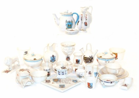 Goss and Crested china, including a Roman ewer from original in Hospitium, found at York, Arms of Dorchester, pair of marmalade preserve pots and covers, Arms of Herne Bay and Warminster, teapot, Arms of Chipping Norton, The Melrose Cup, Arms of Swindon, 