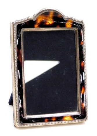 An Elizabeth II silver and faux tortoiseshell strut photograph frame, Sheffield 2000, 12cm x 8cm.