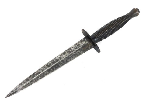 A post-war Fairbairn-Sykes commando knife, with a steel blade, 30cm long.