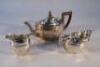 A George V silver three piece tea service of ovoid form by The Barker Brothers