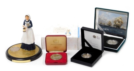 A Celebration of The Wonderful World of Beatrix Potter fifty pence coin collection, Florence Nightingale "Lady With The Lamp" commemorative crown, with figural stand, Mary Rose two pound Piedfort silver proof coin 2011, 200th Anniversary of Nelson at Traf