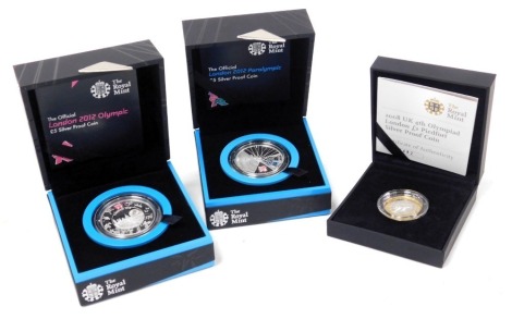 The Royal Mint commemorative five pound silver proof coins, for The Official London 2012 Olympic, and London 2012 Paralympic, together with a UK Fourth Olympia two pound Piedfort silver proof coin 2008. (3)