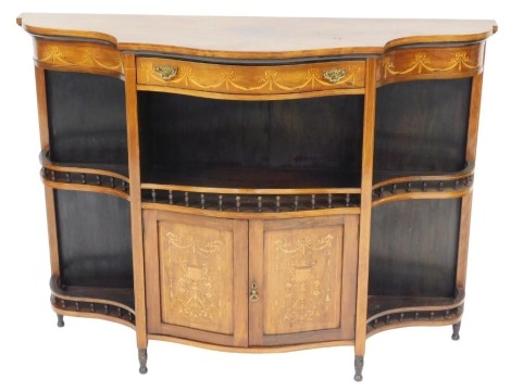 A late Victorian rosewood and inlaid serpentine cabinet, with a frieze drawer over a central galleried shelf flanked by two side shelves, over a pair of cupboard doors, flanked by two further galleried side shelves, raised on turned feet, 103cm high, 137c