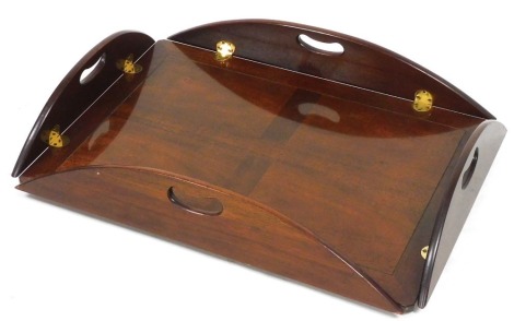 A Georgian style mahogany butlers tray, of shaped rectangular form, with curved handles, 14cm high, 85cm wide, 57cm deep.