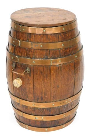 A 19thC copper bound oak barrel, with twin carrying handles, 64cm high.