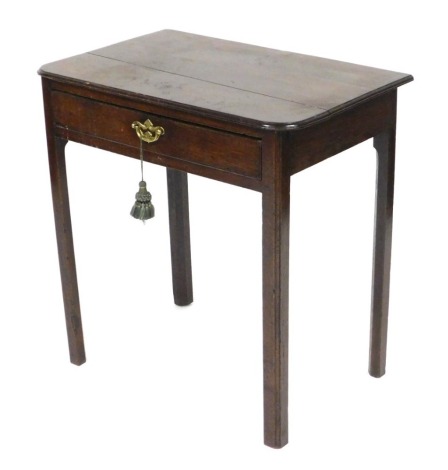 A Georgian 18thC oak side table, with a single frieze drawer, raised on channelled square legs, 70cm high, 66cm wide, 44cm deep.