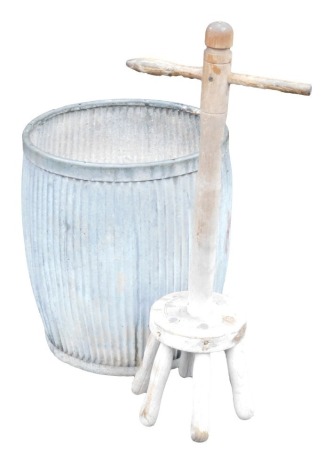 A vintage galvanized metal dolly tub, 51cm high, and an oak posser, 81cm high. (2)