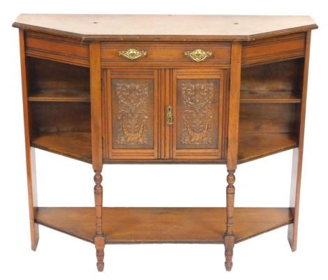 A Victorian mahogany chiffonier, mirror back lacking, with a frieze drawer over a pair of carved, panelled doors, flanked by demi and triangular shelves, raised on turned supports, united by an undertier, 102cm high, 12cm wide, 38.5cm deep.