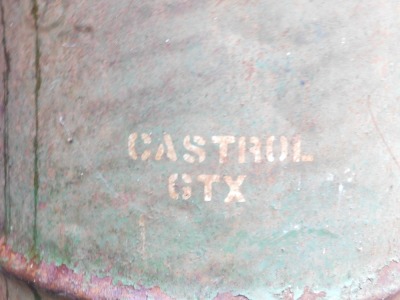 A Castrol GTX 25ltr green painted metal oil drum, 57cm high. - 2