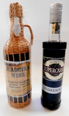 A bottle of Creme Cassis, together with a bottle of Madeira Wine, in original packaging with basket cover, and six miniature bottles of Schladerer Schnapps, and a wine rack. (9) - 2