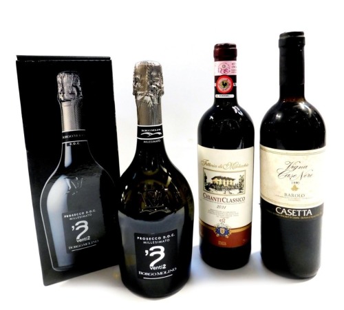 A bottle of Vigna Case Nere 1990 Barolo, a bottle of Chianti Classico 2001, and a bottle of Borgo Molino Venti Prosecco, boxed. (3)