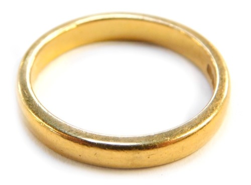 A George V 22ct gold wedding band, Birmingham 1930, ring size R 1/2, 6.4g.