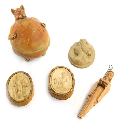 Two 19thC Grand Tour Neo Classical plaster cameos, together with an oval lava cameo, ceramic trinket box modelled as a well fed wolf, etc. (5)