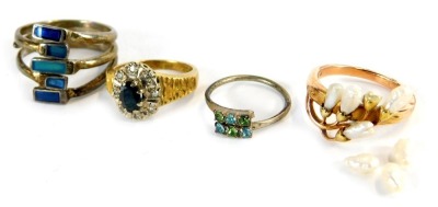 A 1970s 18ct gold sapphire and diamond cluster ring, 5.4g all in, a yellow metal ring with spray of natural pearls (AF), and two modern rings. (4)