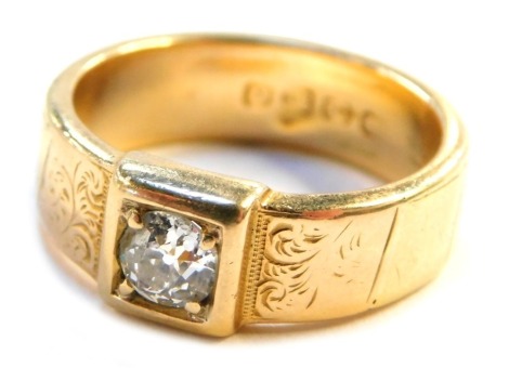 A Victorian two colour 18ct gold gentleman's diamond solitaire ring, with floral chased shoulders and old cut diamond, 3.8mm x 3.88mm x 2.4mm, approx 0.18ct, Chester 1890, size O 1/2, 6.2g all in.