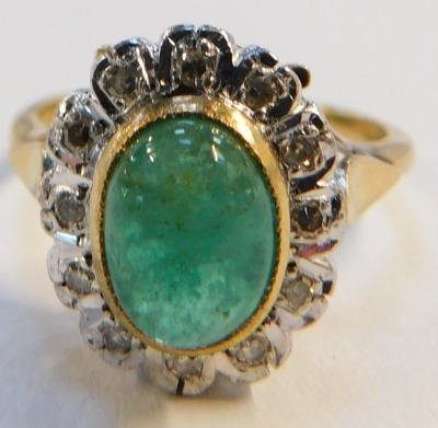 A cabochon emerald and diamond dress ring, on a yellow metal shank stamped 18ct, size P, 5.8g all in. - 3