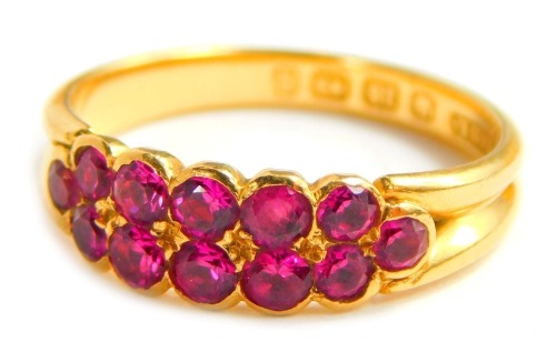 A Victorian 18ct gold garnet dress ring, London 1890, size O 1/2, 3.7g all in.